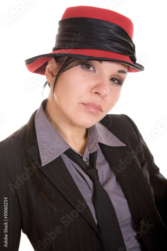 attractive brunette woman with hat. over white background