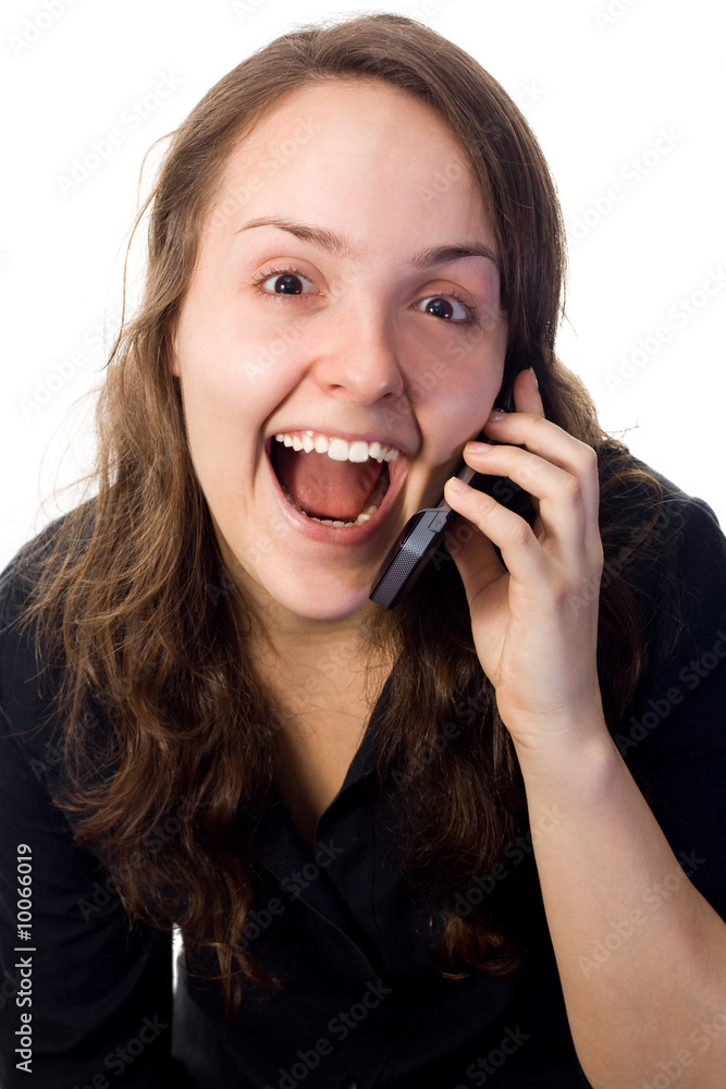 Woman receiving a surprising phone call. White background. Woman receiving a surprising phone call. White background.