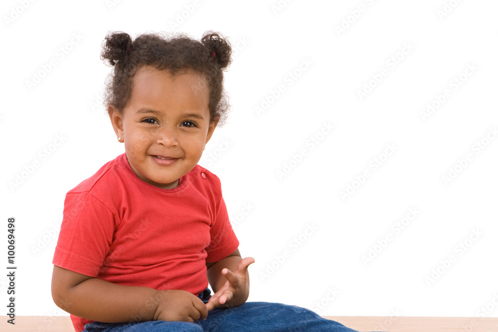 Adorable african baby sitting on a over white background Adorable african baby sitting on a over white background