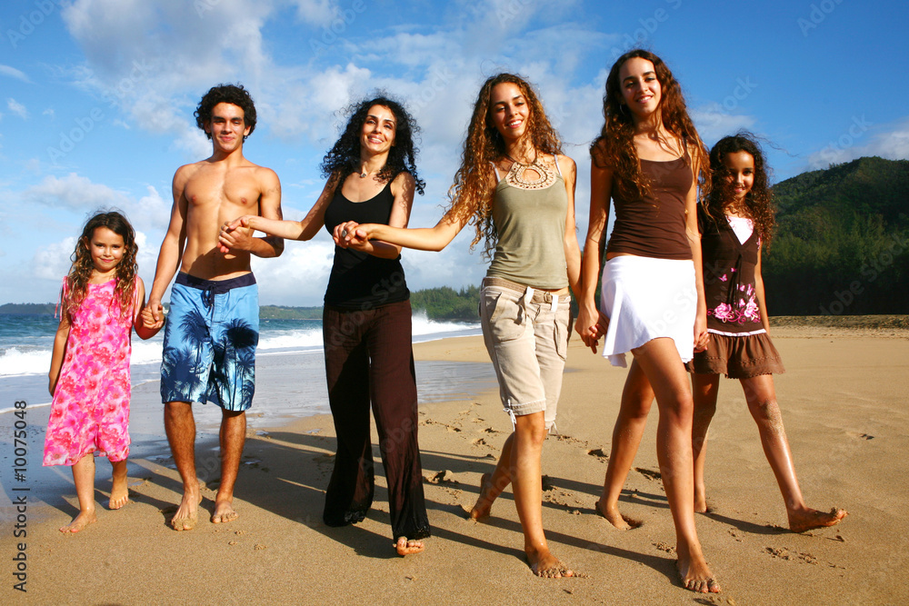 Mother With Her 5 Children Walking Along the Beach Mother With Her 5 Children Walking Along the Beach