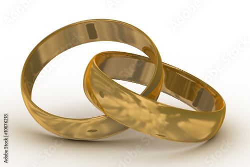 Two gold wedding rings. the...