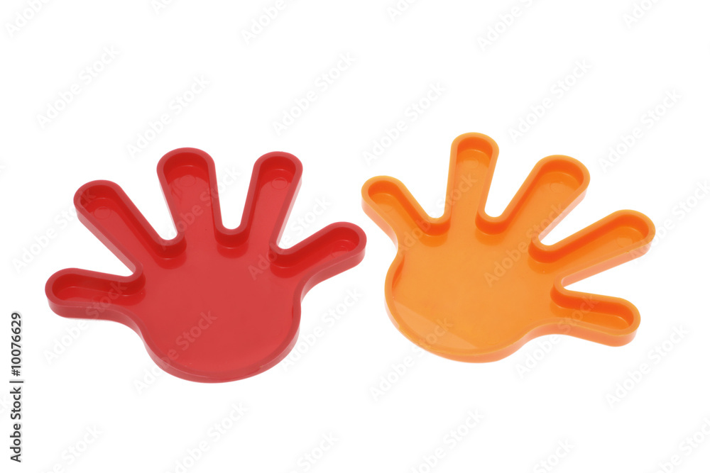 Pair of Plastic Toy Hands on White Background