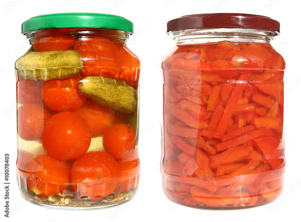 Tinned vegetables in glass bank on a white background. Tinned vegetables in glass bank on a white background.