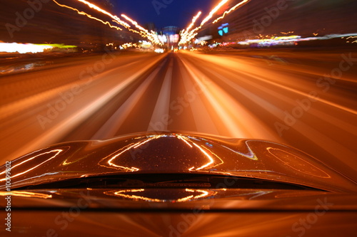 speed drive on car at night motion blurred