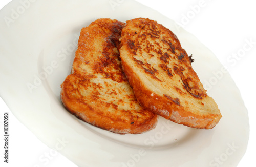 two fresh toastes on white plate