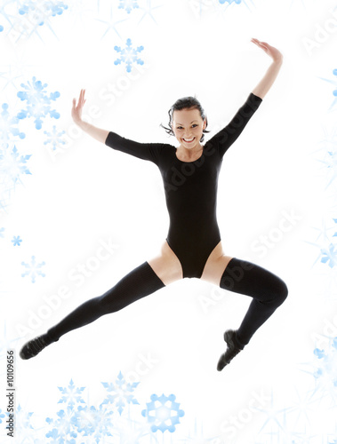 picture of jumping girl in black leotard with snowflakes