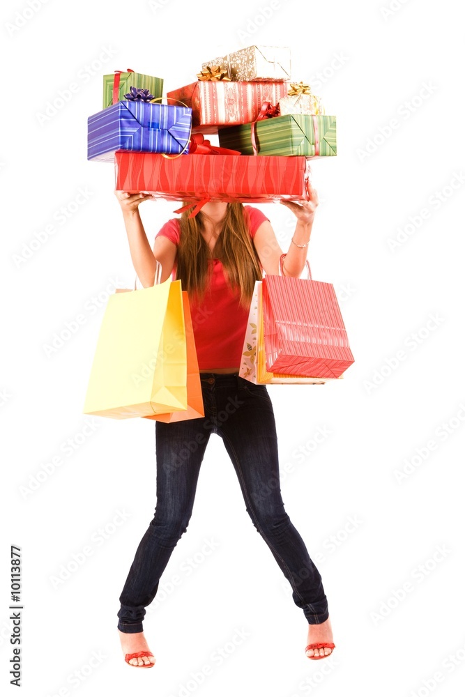 Pretty shopping girl hold many gift boxes and bags