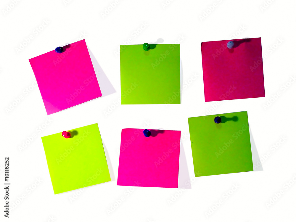 A different color post it note and pins A different color post it note and pins