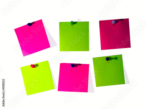 A different color post it note and pins photo