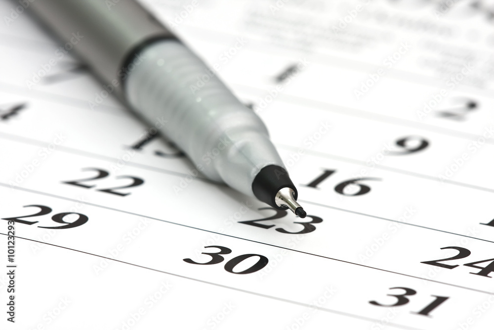 Black pen on a calendar.