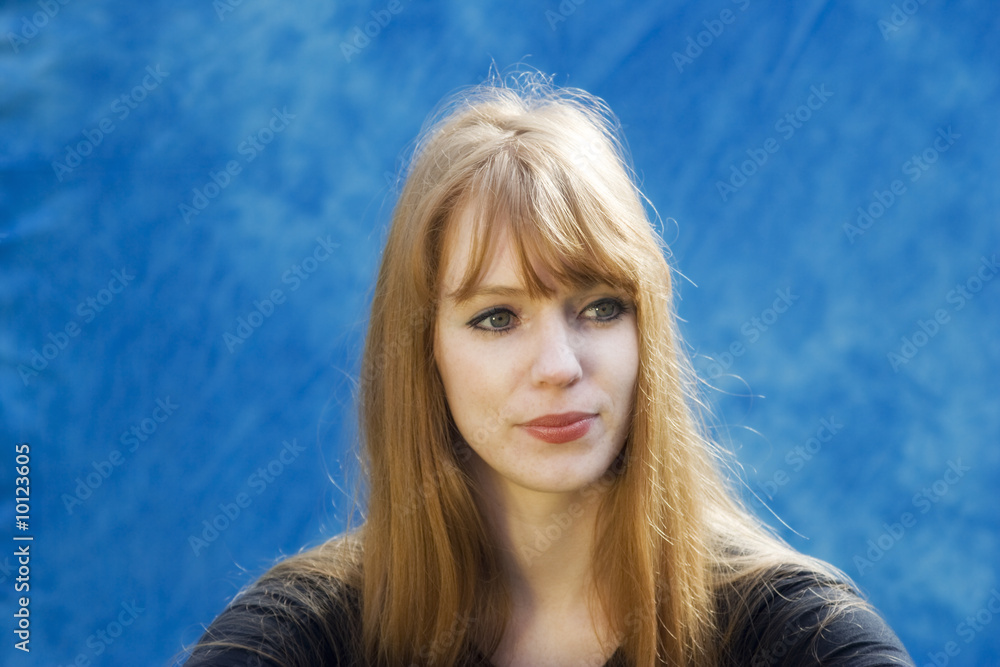 Portrait of a young woman - with red hair
