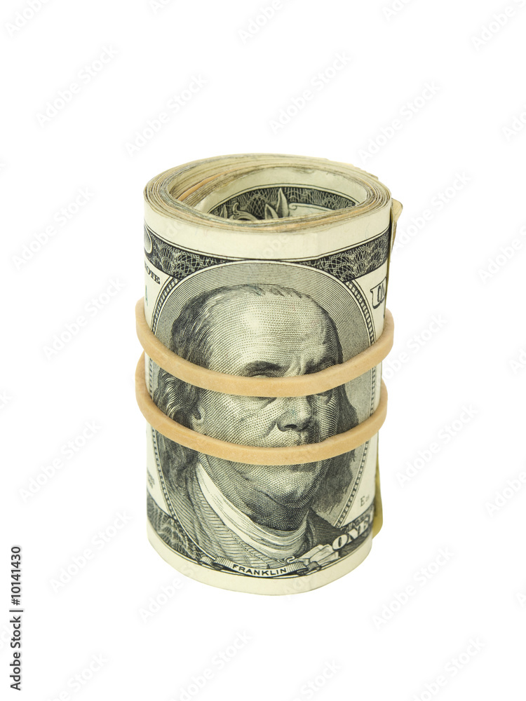 A roll of one hundred dollar bills wrapped with a rubber band. Stock Photo  | Adobe Stock