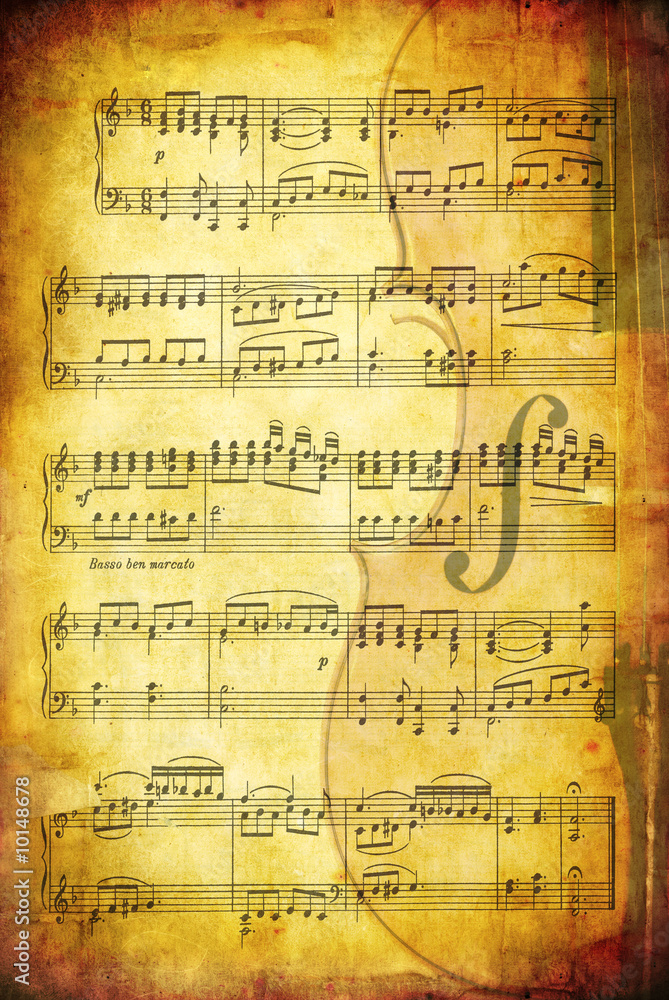Grunge background with sheet music and a cello.
