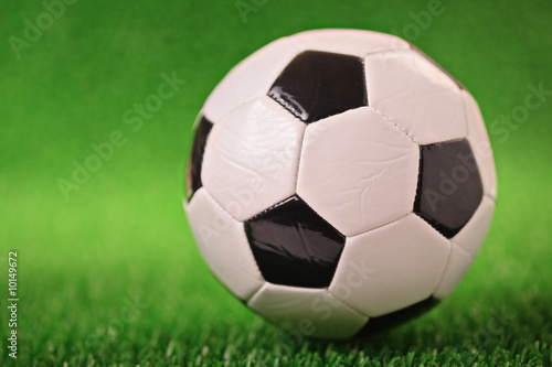 Soccer ball on a green grass