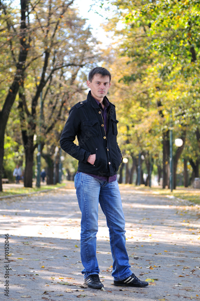 happy young casual man outdoor portrait posing happy young casual man outdoor portrait posing