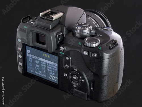 black DSLR back view with LCD screen