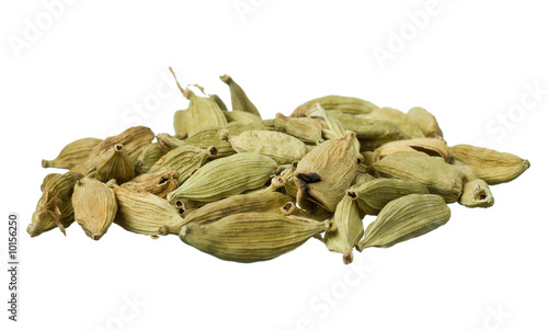 Dried cardamom seeds isolated on white photo