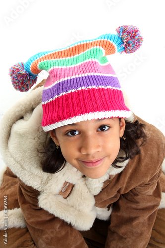 Young Girl Posing Against A...
