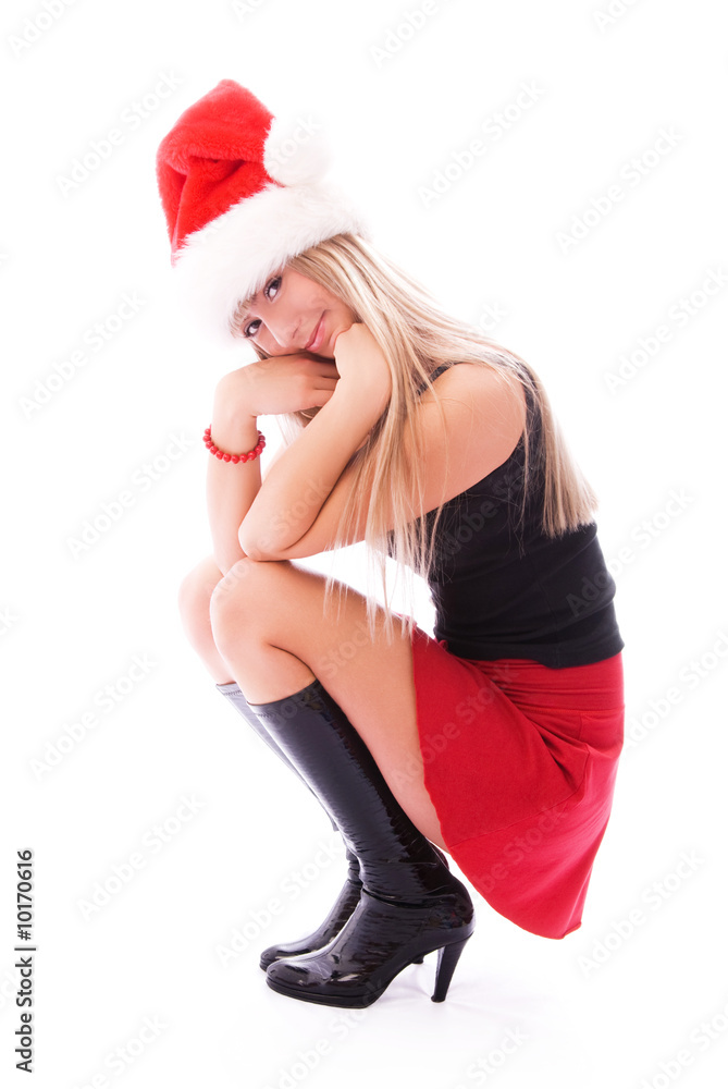 beautiful blond slim girl wearing Santa's hat beautiful blond slim girl wearing Santa's hat