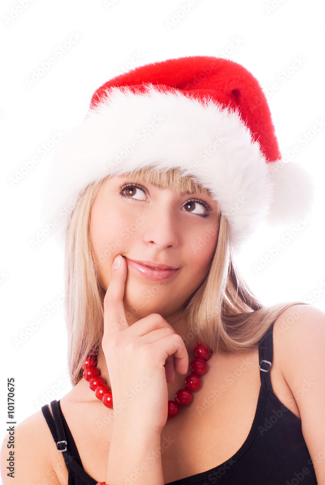 beautiful thoughtful girl wearing Santa's hat beautiful thoughtful girl wearing Santa's hat