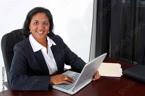 Woman in an office who is r...