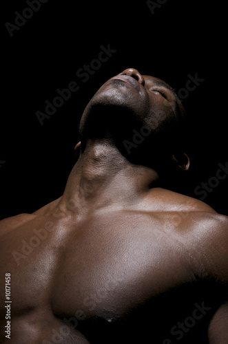 Close up of  worked pectorals of an African American Young.
