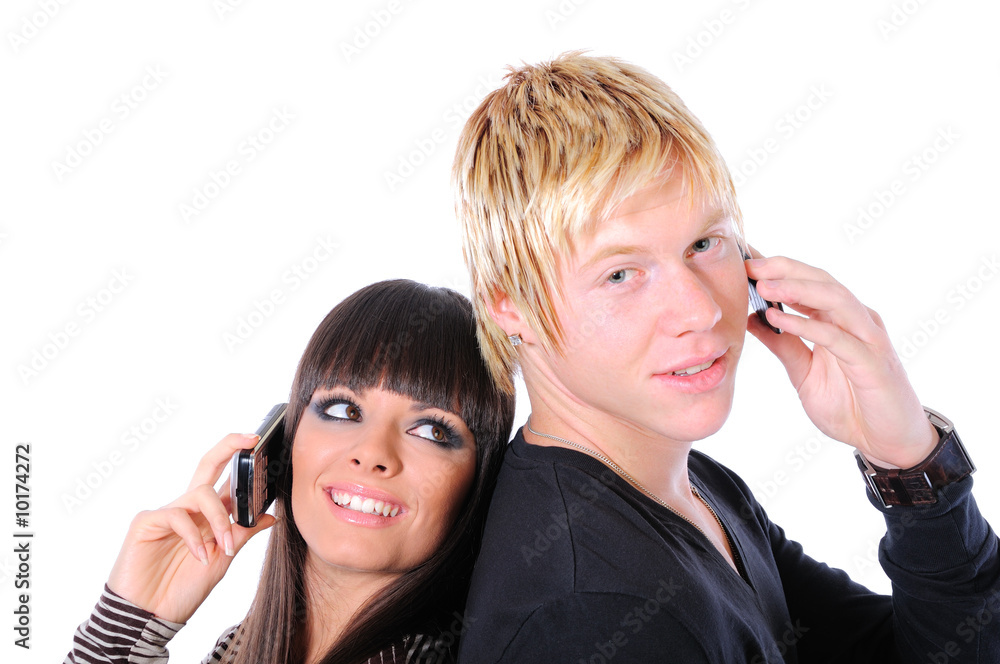 Couple talking on the phone back to back Couple talking on the phone back to back