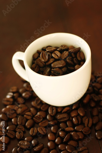 Cup of coffee and coffee beans
