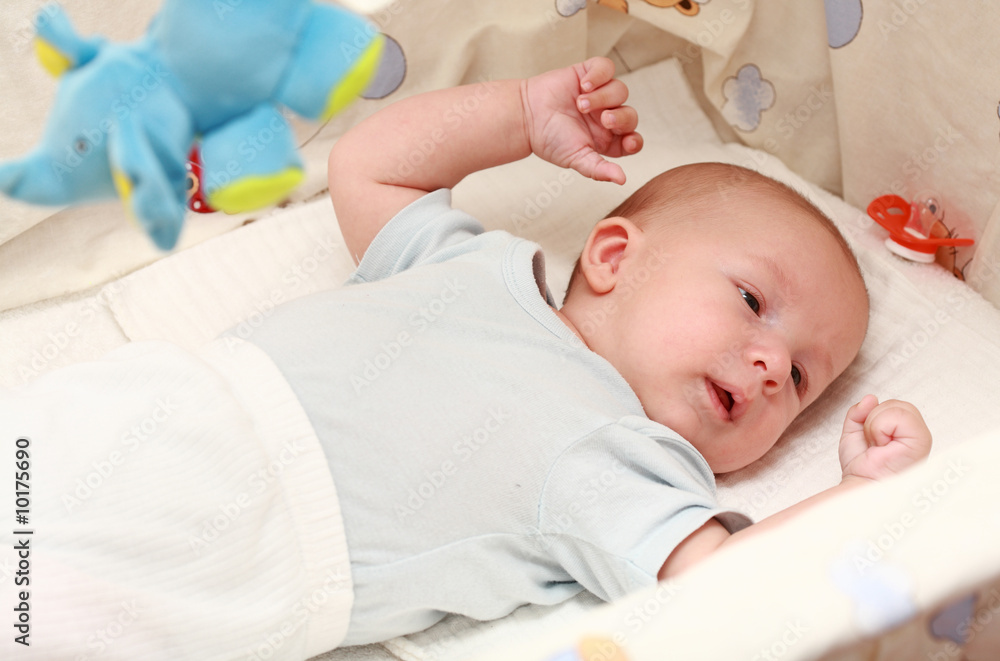 Sweet newborn lying in the cradle Sweet newborn lying in the cradle