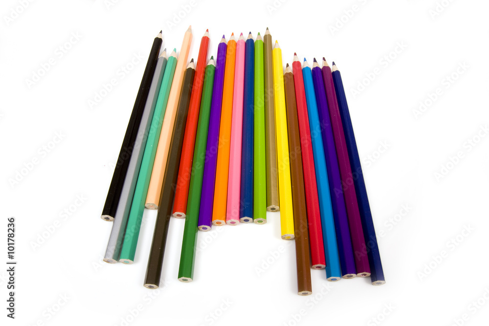 Coloured drawing pencils isolated on a white studio background. Coloured drawing pencils isolated on a white studio background.