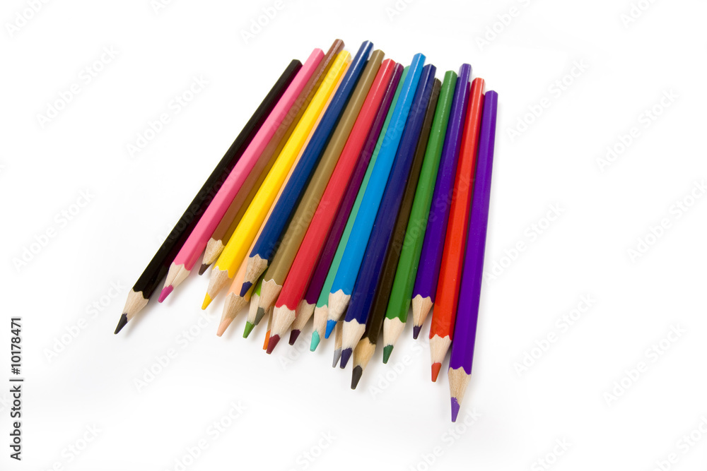 Coloued drawing pencils isolated on a white studio background. Coloued drawing pencils isolated on a white studio background.