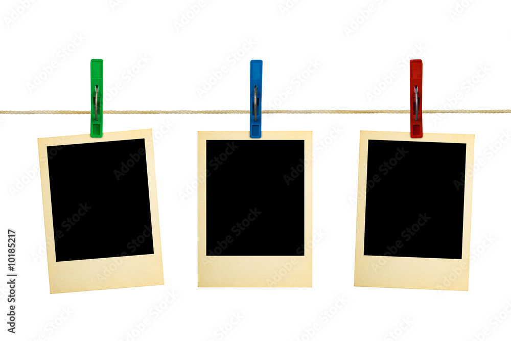 Retro photography on clothespins isolated on white background Retro photography on clothespins isolated on white background