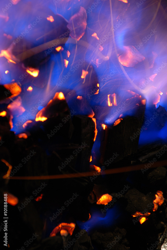 Obraz premium Fire of hot blue flames .