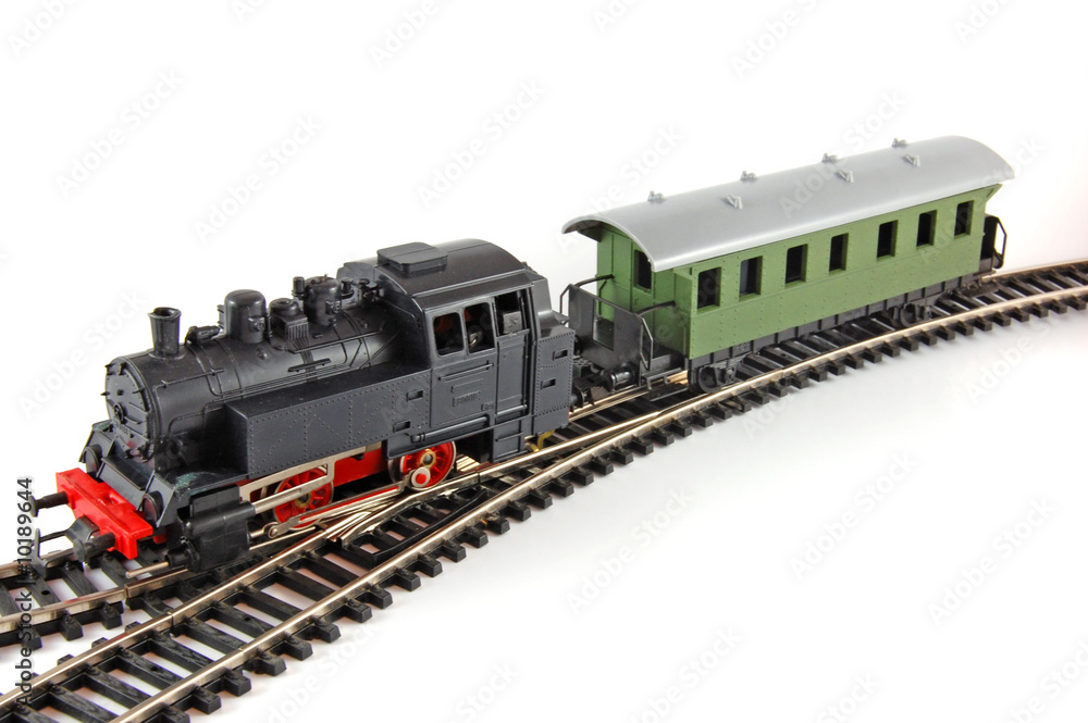 Toy Steam Train and caboose on white background Toy Steam Train and caboose on white background
