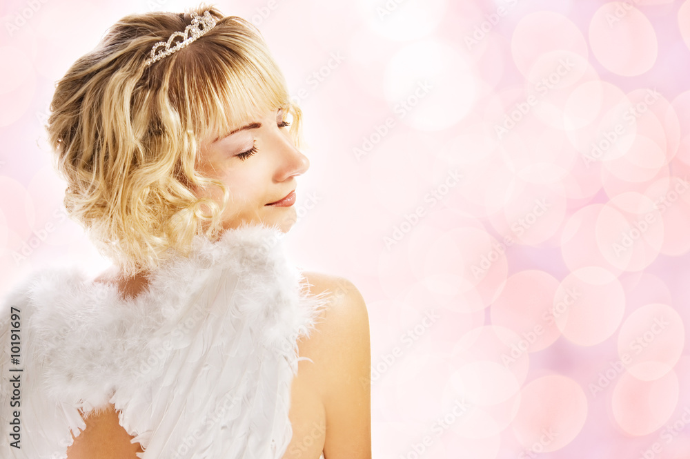 Beautiful angel over abstract pink background Beautiful angel over abstract pink background