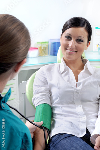 nurse and woman, checkup