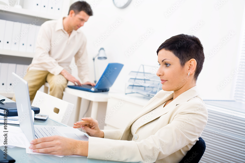 Obraz premium Business couple working at office.