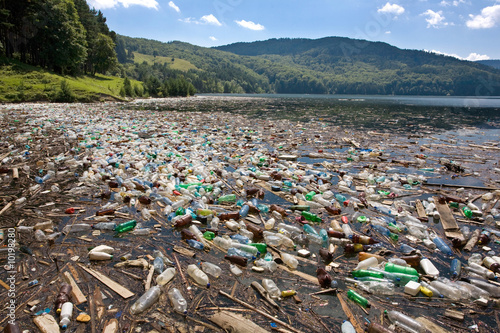 very important plastic and trash pollution on beautiful lake photo