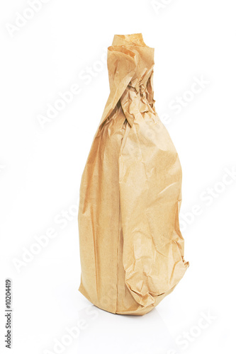 brown paper bag with a bottle isolated