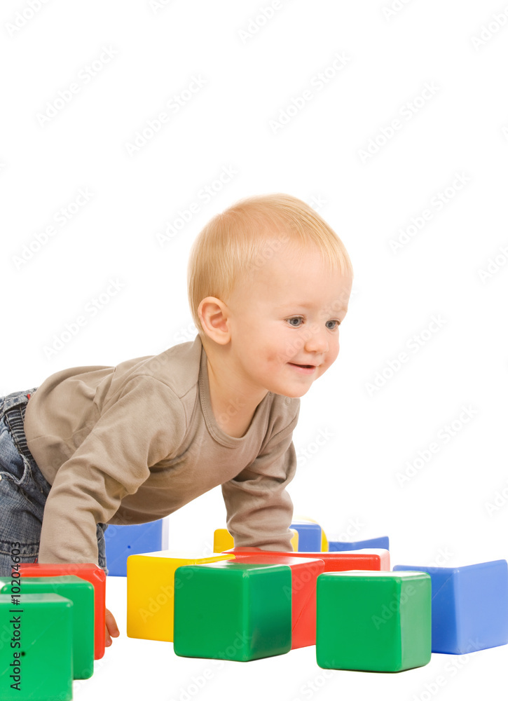 little boy play with bricks. isolated on a white background little boy play with bricks. isolated on a white background