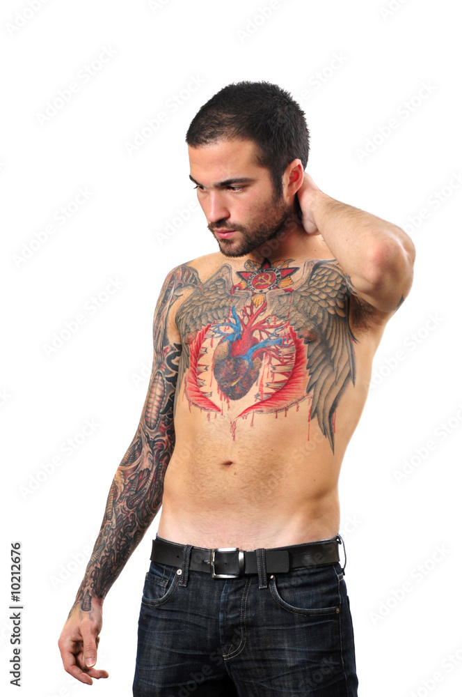 guy with a tattoo posing in studio guy with a tattoo posing in studio
