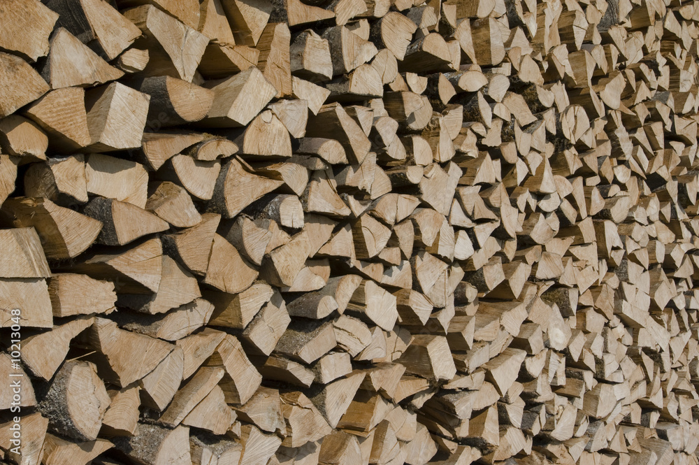 Woodpile out behind the barn in Switzerland Woodpile out behind the barn in Switzerland