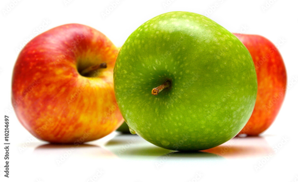 Red and green apples on the white background. Isolated. Red and green apples on the white background. Isolated.