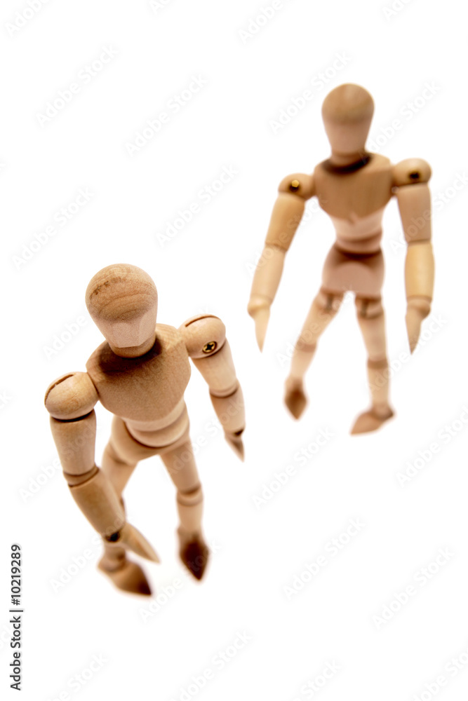 Wooden mannequins isolated on white background Wooden mannequins isolated on white background