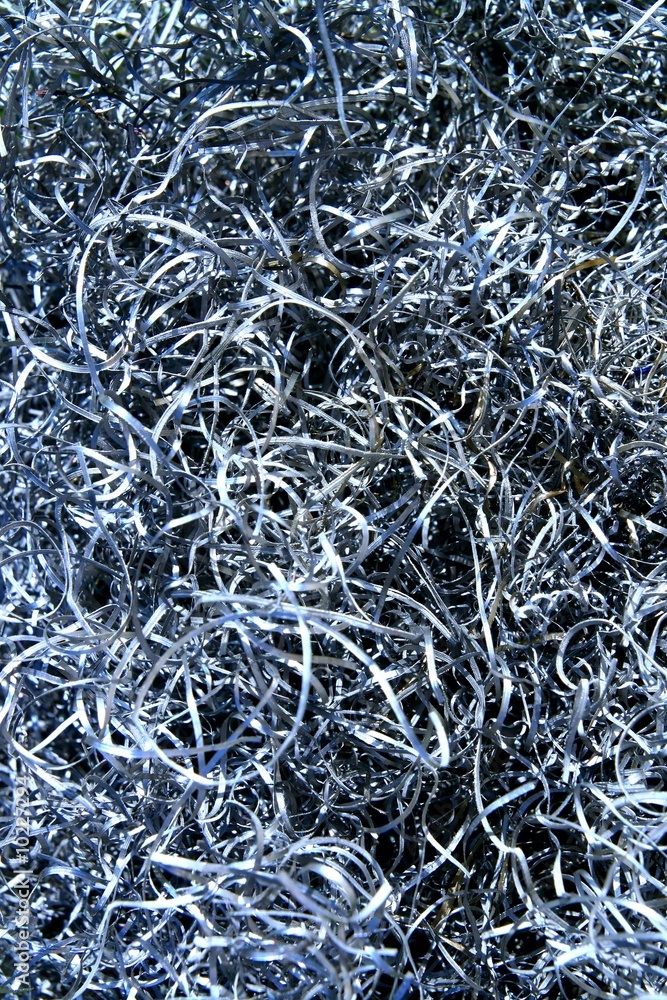 Mountain of the metallic swarf very closeup - swarf background Mountain of the metallic swarf very closeup - swarf background