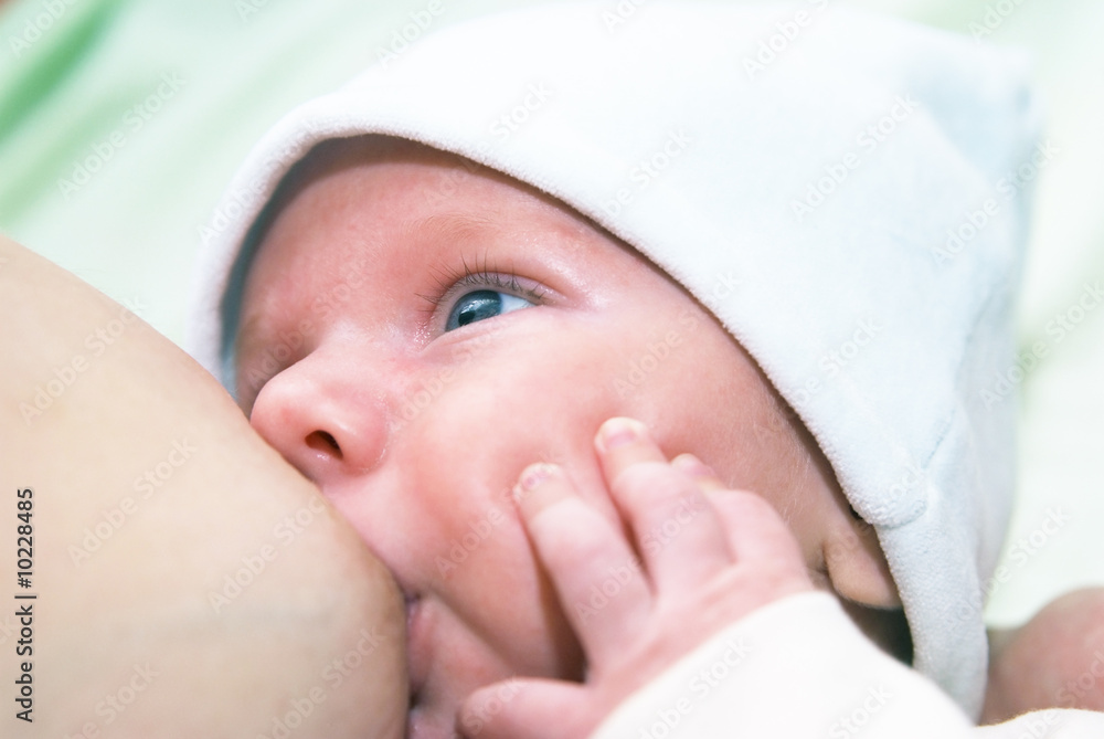 Breast-feeding of newborn baby Breast-feeding of newborn baby