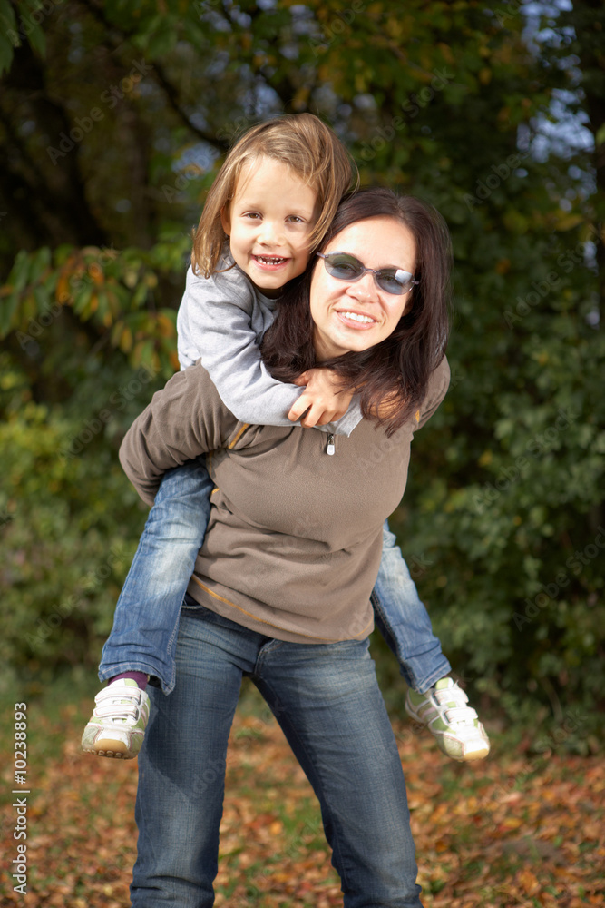 mother and daughter on a beautiful autumn day mother and daughter on a beautiful autumn day