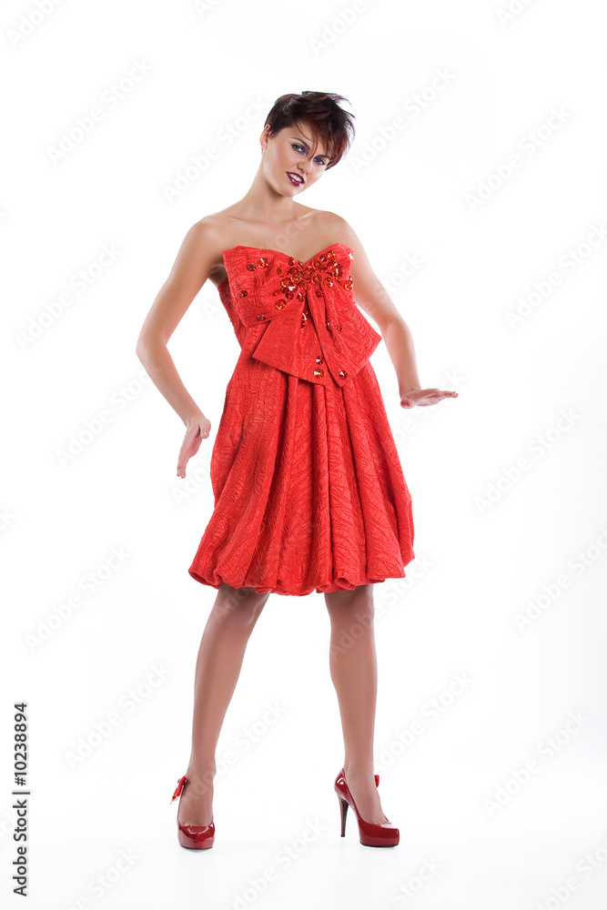 Young woman in fashionable dress and with stylish hairdressing Young woman in fashionable dress and with stylish hairdressing