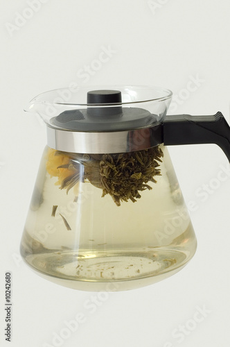 A glass teapot with Lotus F...