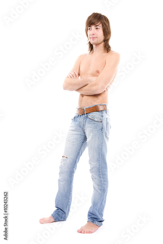 Topless man with blue jeans over white
